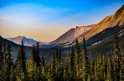 Scenic view of mountains against sky at sunset