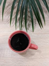 Close-up of coffee cup on table