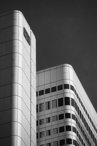 Low angle view of modern building against clear sky