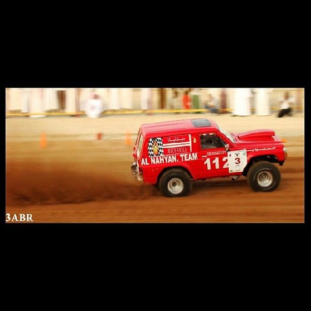 transportation, land vehicle, mode of transport, car, transfer print, auto post production filter, indoors, red, night, communication, close-up, focus on foreground, selective focus, text, street, no people, travel, technology, western script