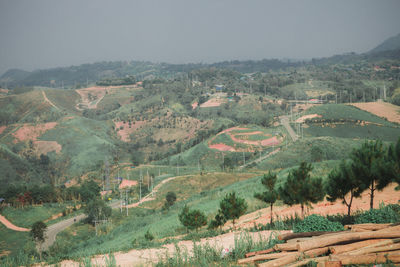 Aerial view of agricultural landscape against sky