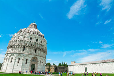 Low angle view of historical building against blue sky