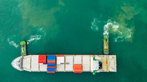 High angle view of ship sailing on sea