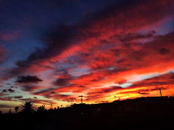 Scenic view of dramatic sky during sunset