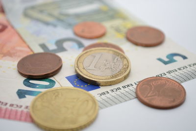 Close-up of coins on table