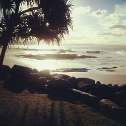 Scenic view of sea at sunset