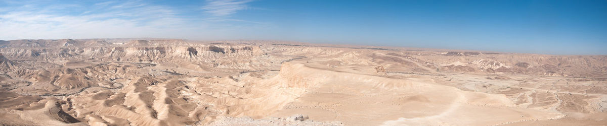 Panoramic view of desert against sky