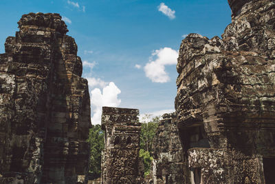 Low angle view of old buildings against sky