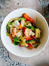 High angle view of salad in bowl on table