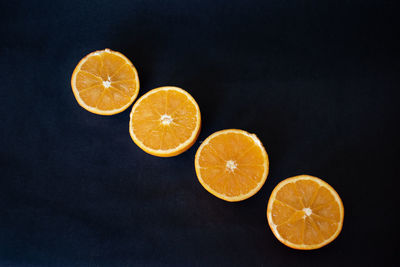 View of lemon slice against black background