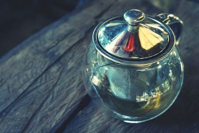 Close-up of water in jar on table