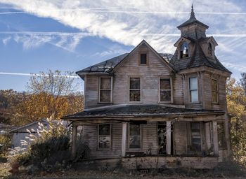 Low angle view of old building against sky