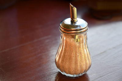 Close-up of drink in jar on table