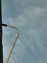 Low angle view of street light against sky