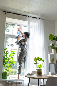 Side view of man working at home