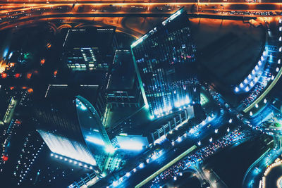 High angle view of illuminated cityscape at night