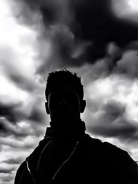 Low angle view of statue against cloudy sky