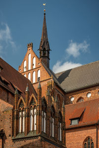 Low angle view of temple building against sky