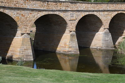 Arch bridge over river