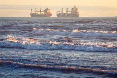 Scenic view of sea against sky during sunset