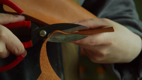 Close-up of man holding hands