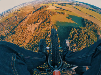 Low section of man relaxing on land