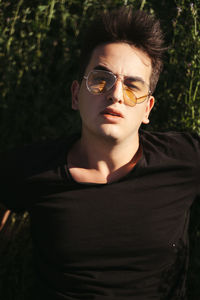Portrait of young man wearing sunglasses