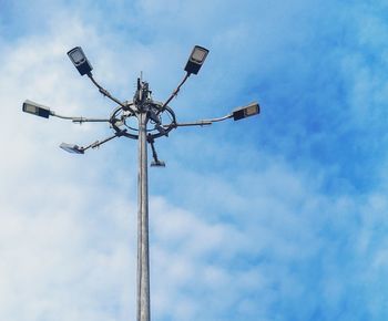 Low angle view of street light against sky