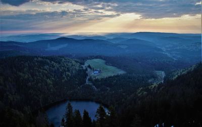 Scenic view of mountains against sky during sunset