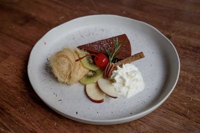 High angle view of fruit salad in plate on table