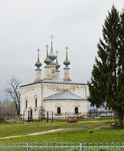 View of temple against building