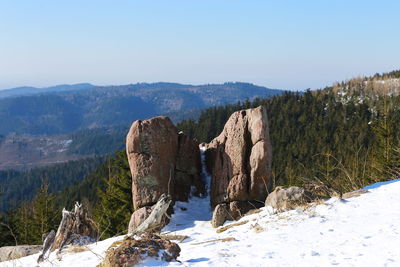 Panoramic view of mountains against clear sky