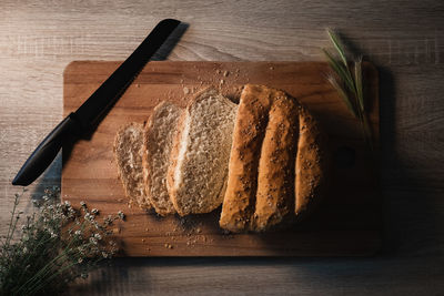 High angle view of bread on cutting board