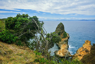 Scenic view of calm sea against sky