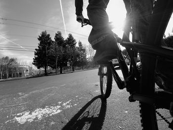 Shadow of people on road