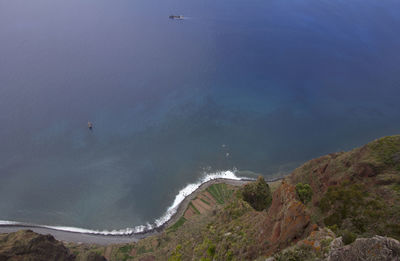 High angle view of sea and mountain from girao cape