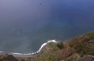 High angle view of sea and mountain