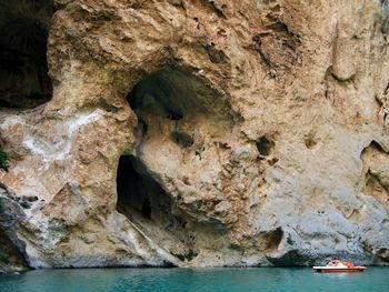 Close-up of rock formation in water