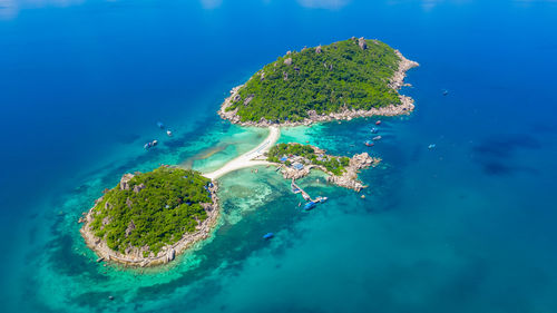 Aerial view of island during sunny day