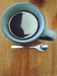 High angle view of coffee cup on table