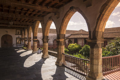 Columns of historic building against sky