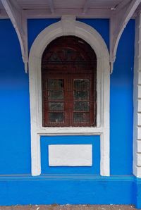 Closed blue door of building