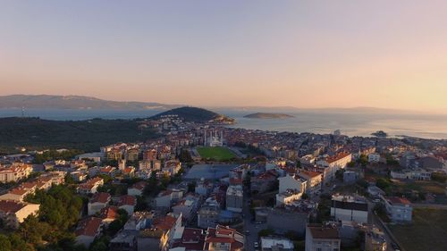 High angle view of townscape against sky during sunset