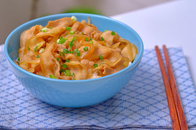 Close-up of noodles in bowl on table