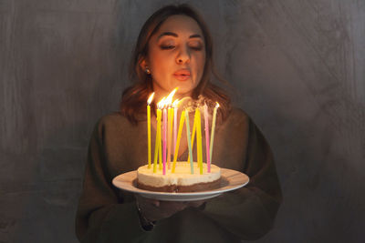 Close-up of illuminated candle