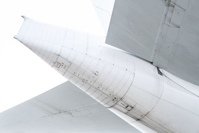 Low angle view of airplane against sky