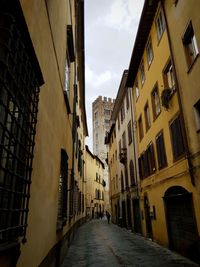 Narrow alley along buildings