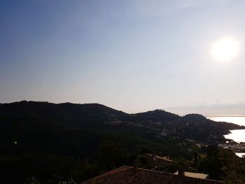 Scenic view of mountains against sky during sunset