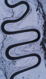 High angle view of snow covered car