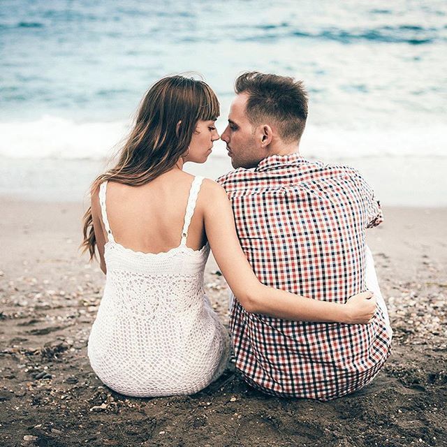 beach, water, childhood, lifestyles, leisure activity, person, sea, casual clothing, full length, shore, girls, elementary age, sitting, sand, three quarter length, vacations, relaxation, standing